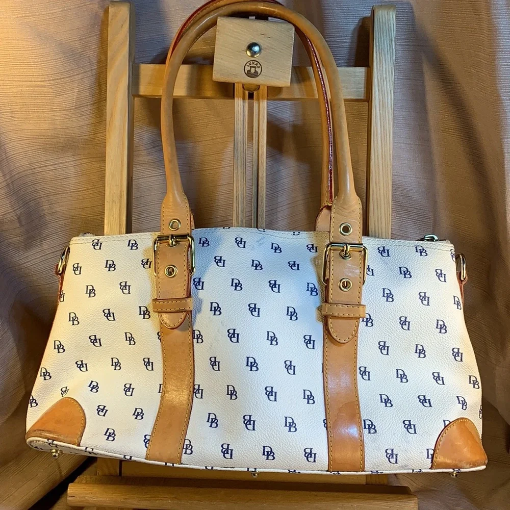 Dooney & Bourke leather satchel w/logo pattern
